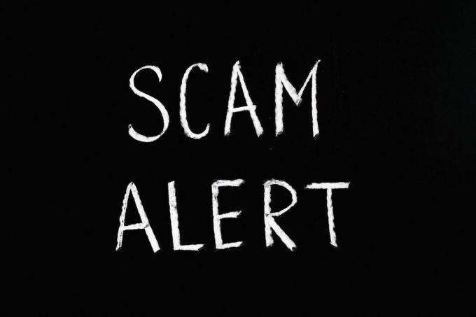 Fotografia Text Saying Scam Alert